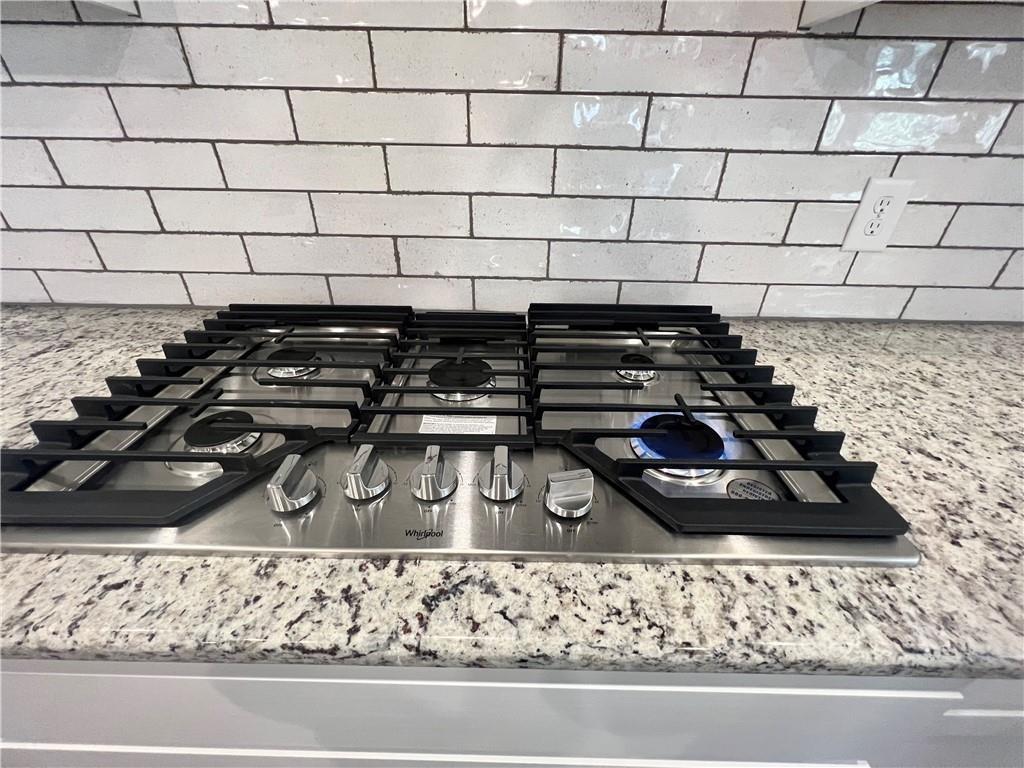 514 Adventure Trail Jefferson, GA 30549 - Photo 21 of 48 a closeup of a sink and a stove