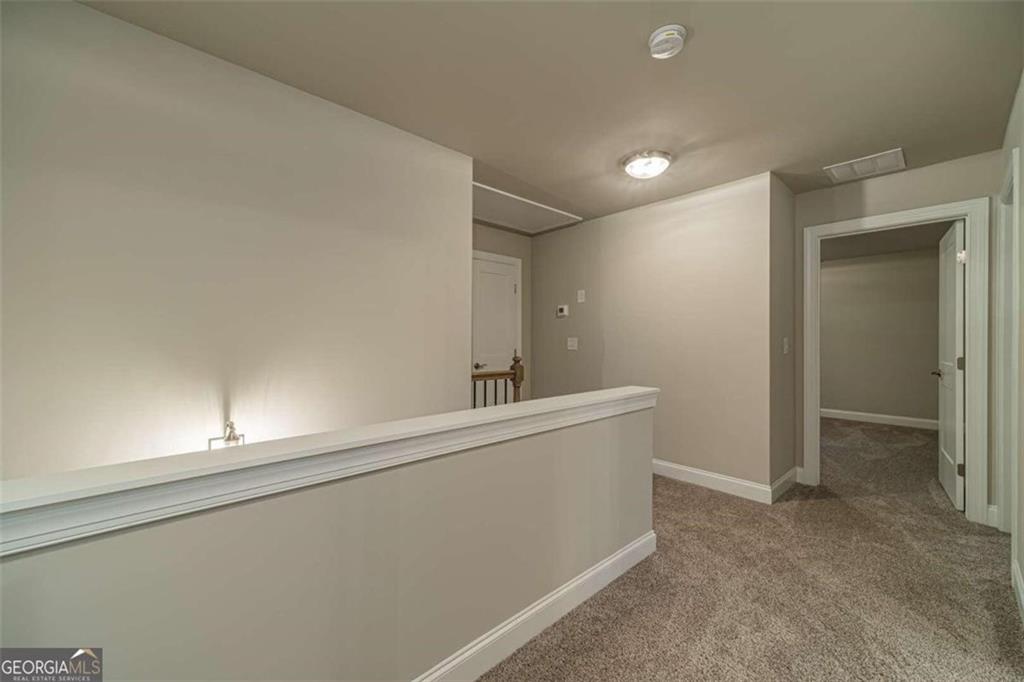 514 Adventure Trail Jefferson, GA 30549 - Photo 25 of 48 a view of a hallway to a room with window