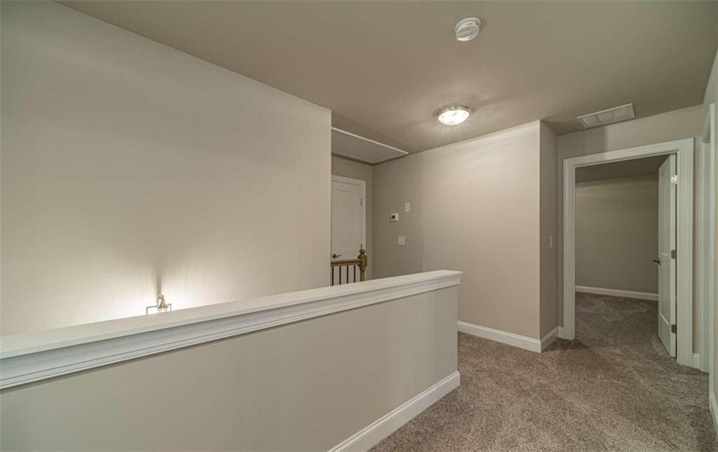 514 Adventure Trail Jefferson, GA 30549 - Photo 26 of 49 a room with a sink and cabinets