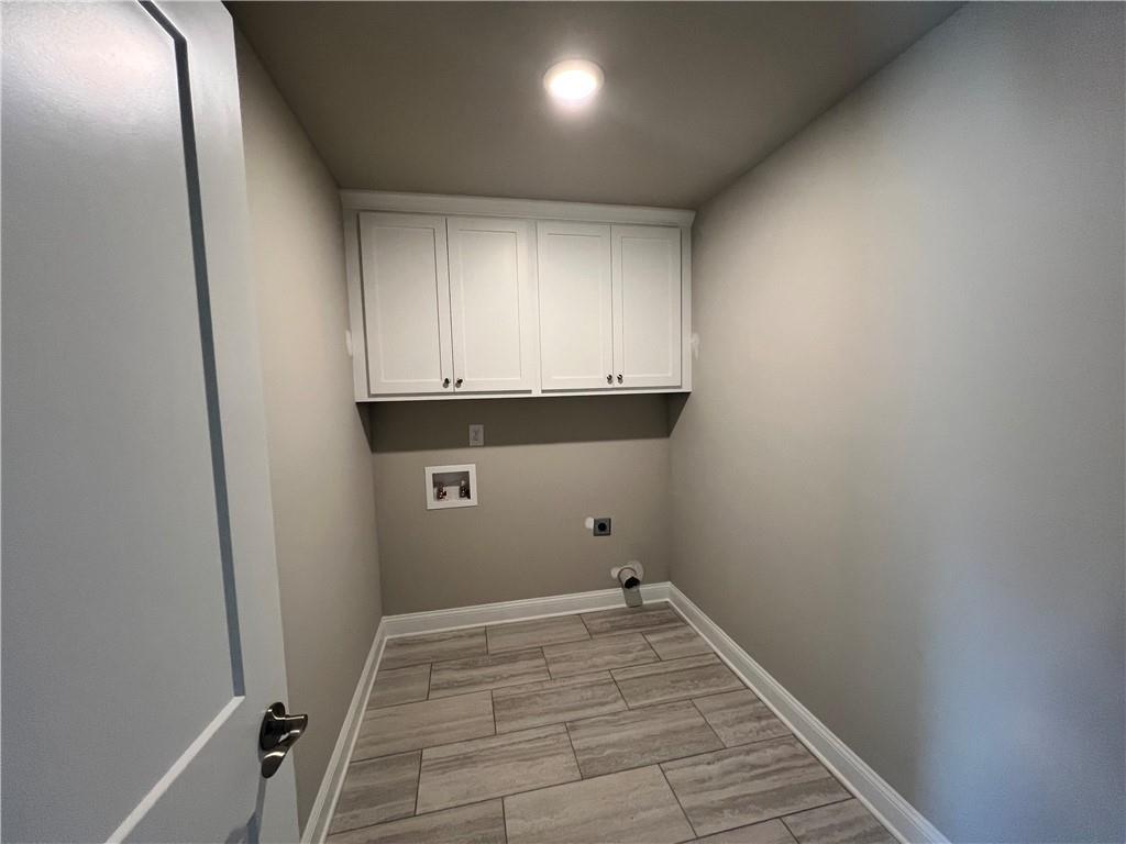 514 Adventure Trail Jefferson, GA 30549 - Photo 29 of 48 a view of storage and utility room with wooden floor