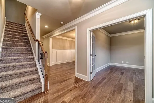 a view of a hallway with staircase