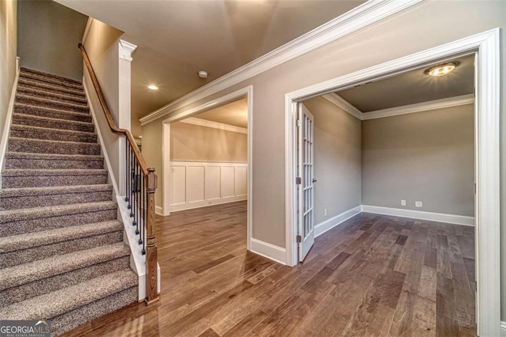 514 Adventure Trail Jefferson, GA 30549 - Photo 4 of 48 a view of a hallway with wooden floor and entryway