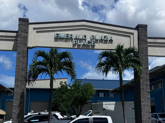 a view of a porch with a table and chairs