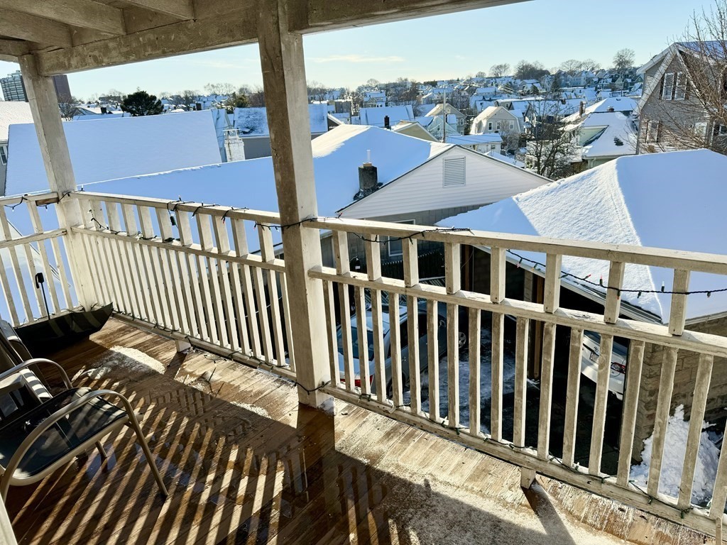 98 Shute Street Everett, MA 02149 - Photo 20 of 37 a view of a houses with a balcony