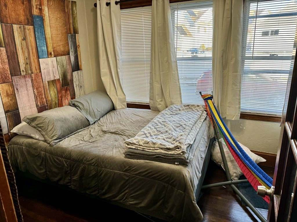 98 Shute Street Everett, MA 02149 - Photo 28 of 37 a bedroom with a bed and a window