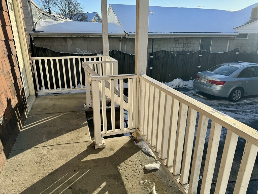 98 Shute Street Everett, MA 02149 - Photo 29 of 37 a view of a balcony with car parked