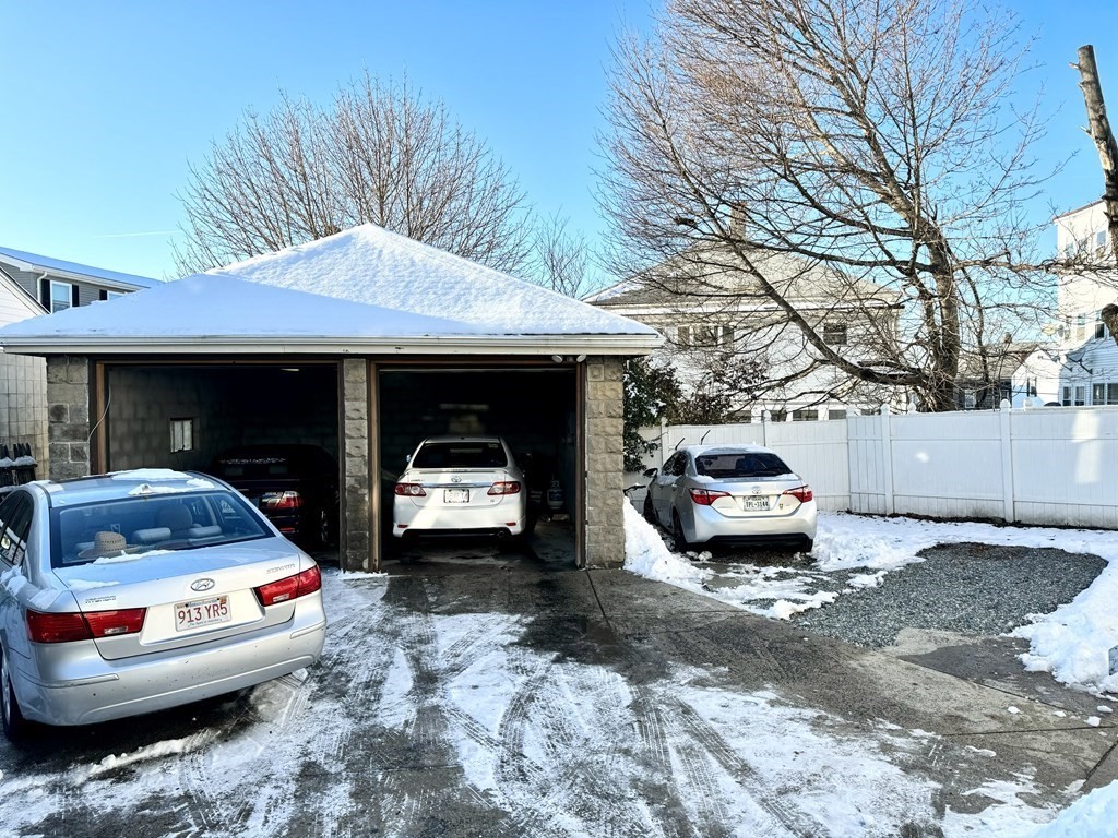 98 Shute Street Everett, MA 02149 - Photo 3 of 37 a car parked in front of a house