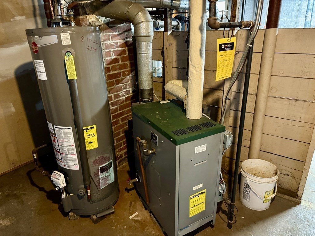 98 Shute Street Everett, MA 02149 - Photo 33 of 37 a bathroom with a sink toilet and mirror
