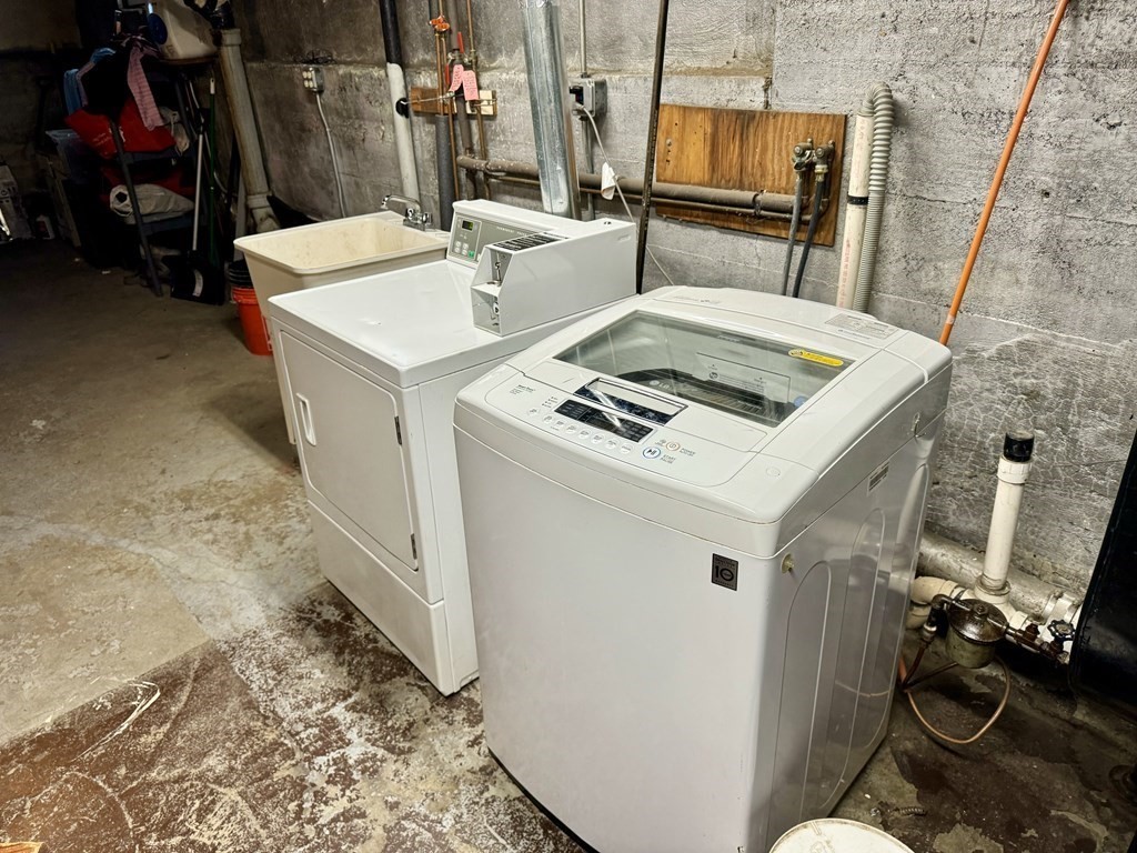 98 Shute Street Everett, MA 02149 - Photo 35 of 37 a utility room with dryer and washer
