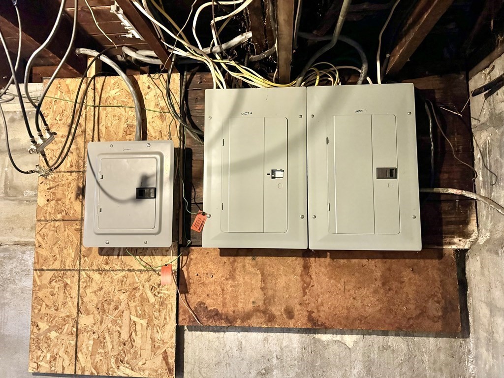 98 Shute Street Everett, MA 02149 - Photo 36 of 37 a bathroom with a granite countertop sink and a mirror