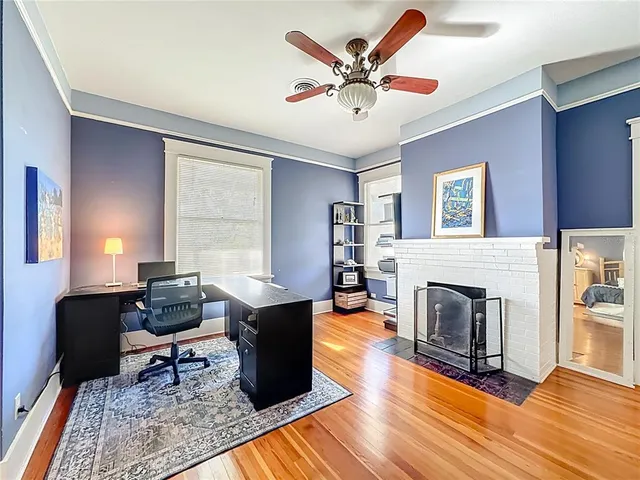 a view of a chairs and table in a patio
