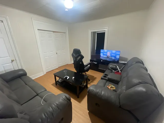 a view of a storage & utility room with a sink