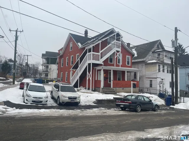 a view of street with large buildings