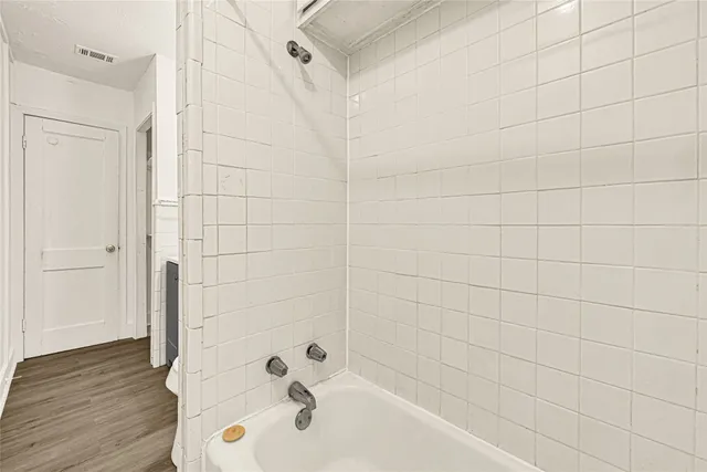 a bathroom with a bathtub