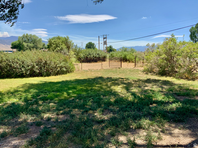 630 North Main Street Monroe, UT 84754 - Photo 56 of 63 View of yard with a rural view and a mountain view
