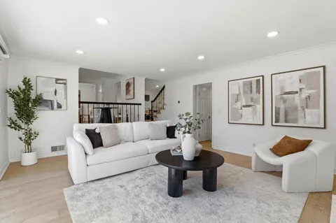 a bedroom with bed and tv