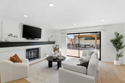 a bathroom with double sink and a mirror
