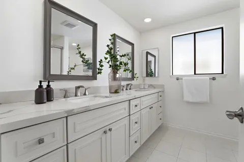 a bed room with a bed and a window