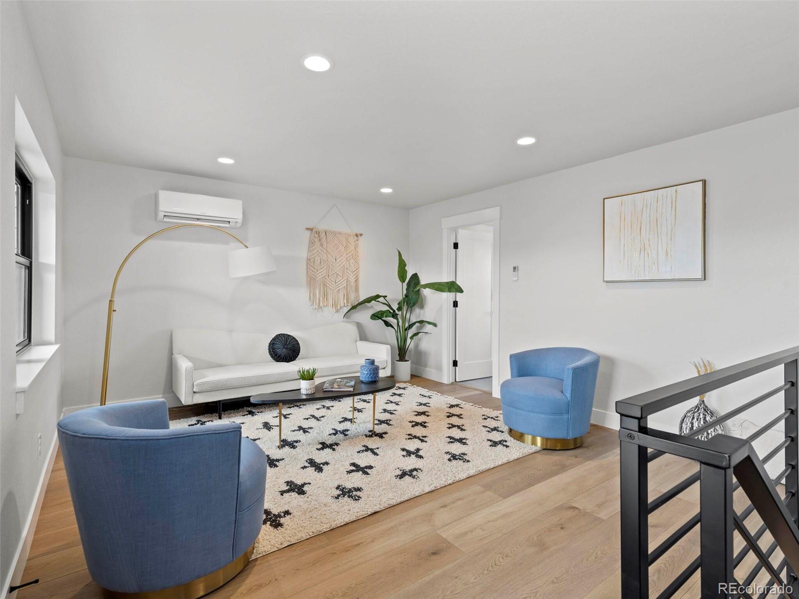 5423 South Prince Street, Unit B Littleton, CO 80120 - Photo 31 of 40 a living room with furniture