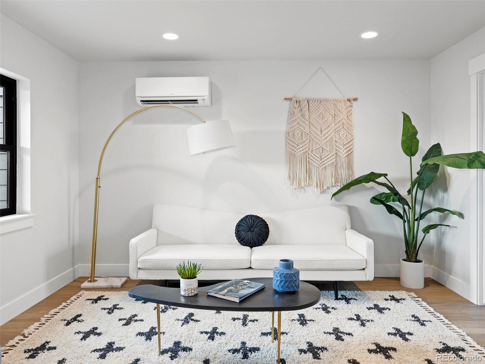 5423 South Prince Street, Unit B Littleton, CO 80120 - Photo 35 of 40 a bathroom with a sink and a mirror