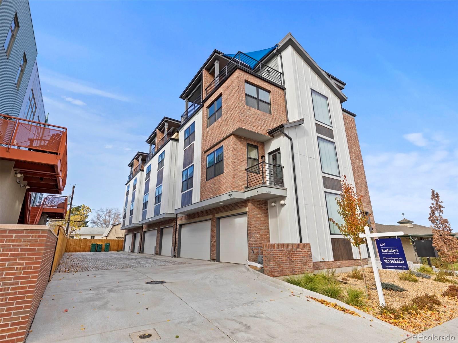 5423 South Prince Street, Unit B Littleton, CO 80120 - Photo 40 of 40 a view of a white building among the street