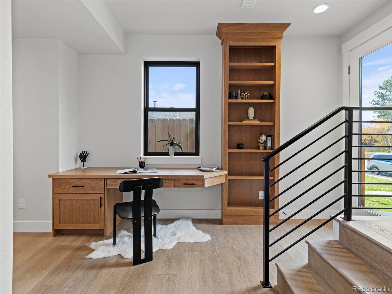 5423 South Prince Street, Unit B Littleton, CO 80120 - Photo 5 of 40 a view of a workspace with furniture