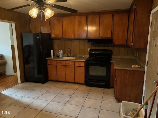 809 Simmons Street Durham, NC 27701 - Photo 7 of 16 a kitchen with stainless steel appliances granite countertop a refrigerator and a sink