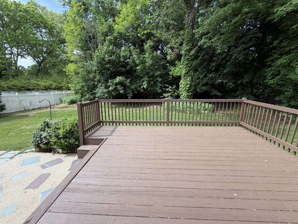 74 Birch Road Longmeadow, MA 01106 - Photo 35 of 38 a white bench sitting in middle of the garden