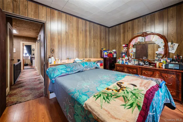 an entryway with wooden floor