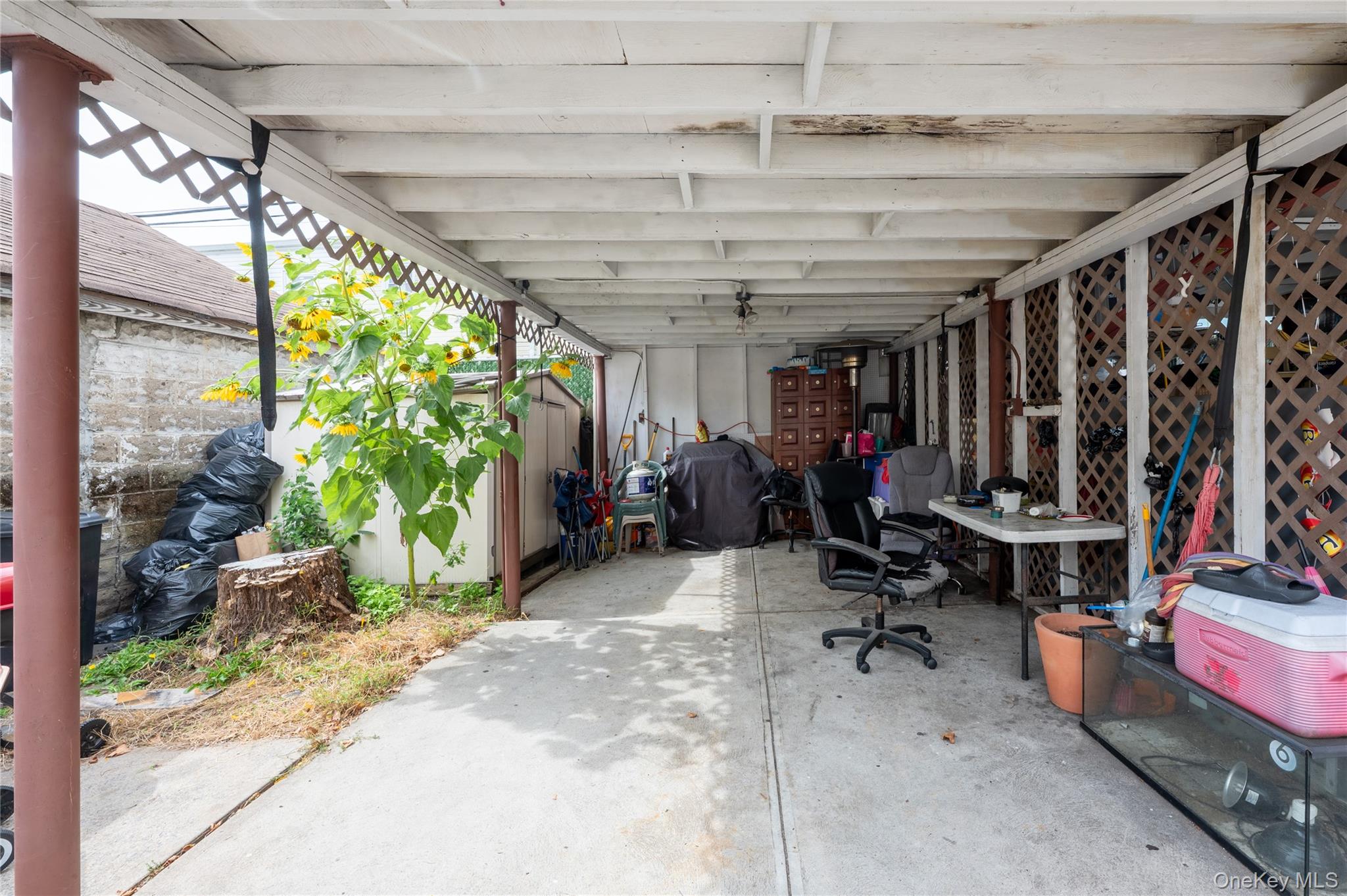 104-48 Lefferts Boulevard Queens, NY 11419 - Photo 18 of 22 a view of a room with gym equipment