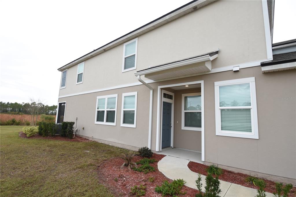 207 Redbud Road Palm Coast, FL 32137 - Photo 2 of 38