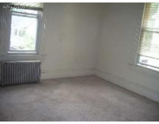 66 Palmer Avenue Springfield, MA 01108 - Photo 7 of 8 an empty room with a window