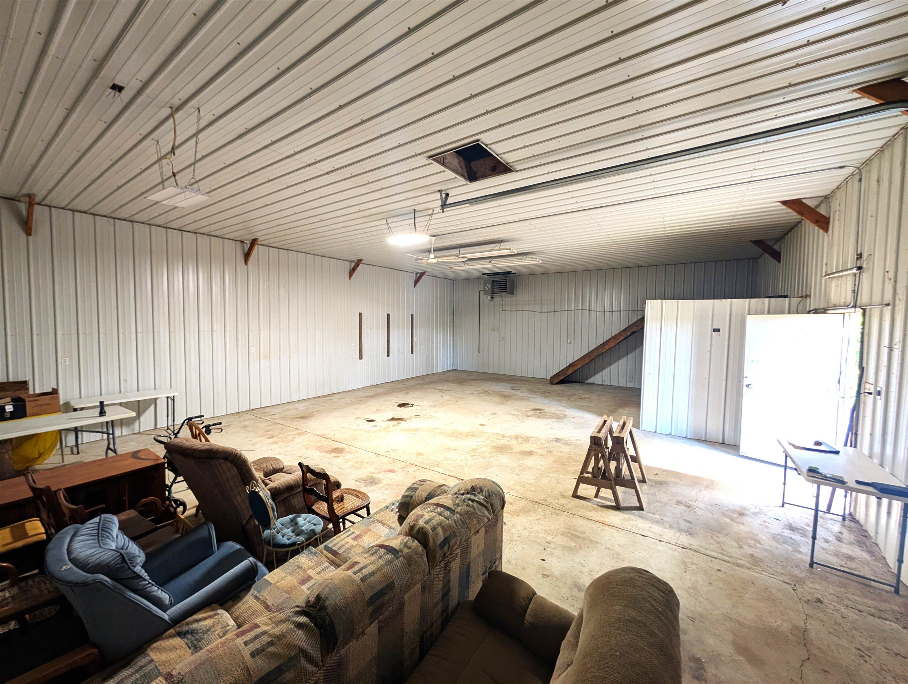 10740 North Barker Road Byron, IL 61010 - Photo 17 of 21 a room with furniture