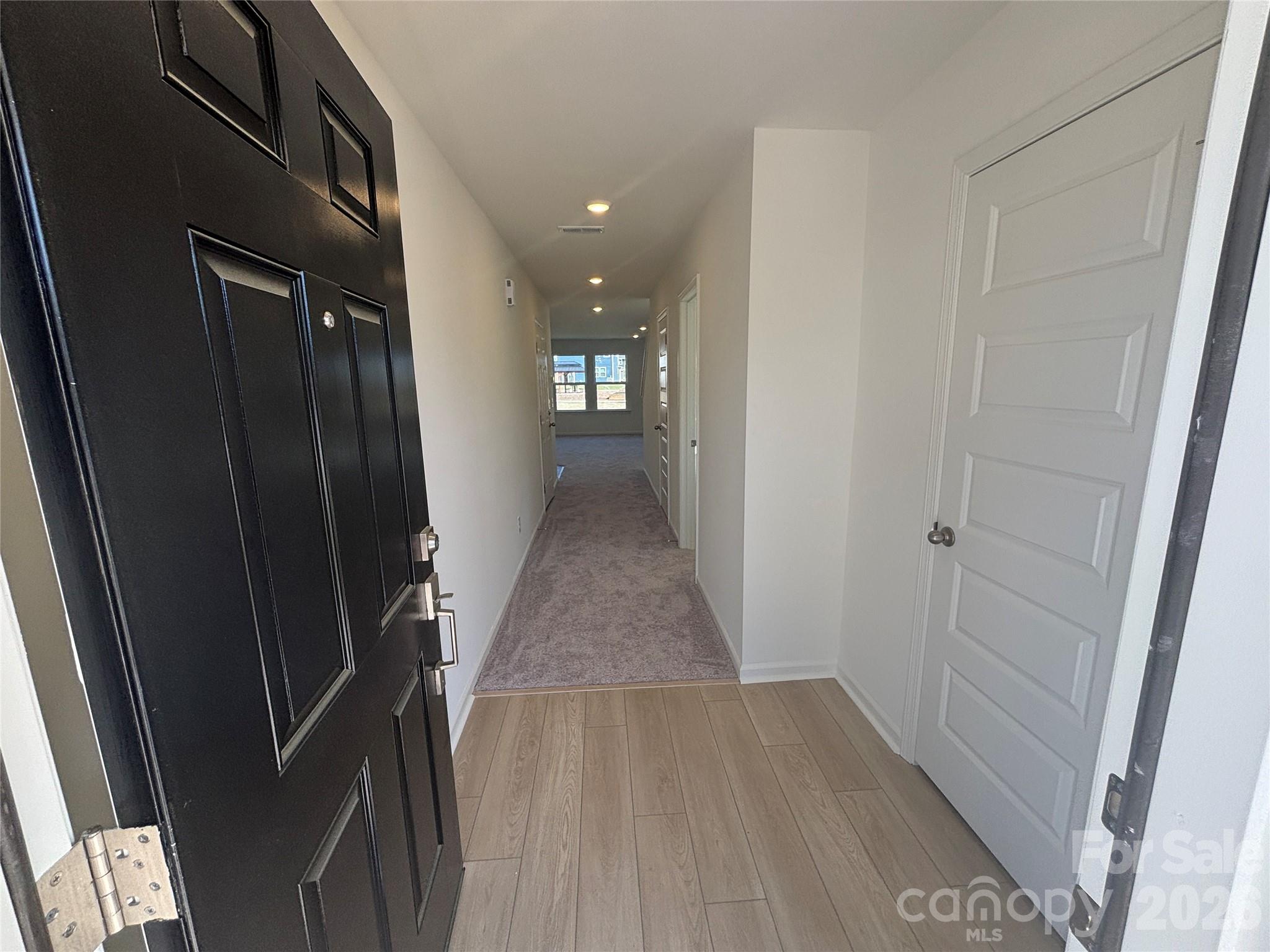 357 Roxanna Lane, Unit 72 York, SC 29745 - Photo 2 of 23 a view of hallway with wooden floor