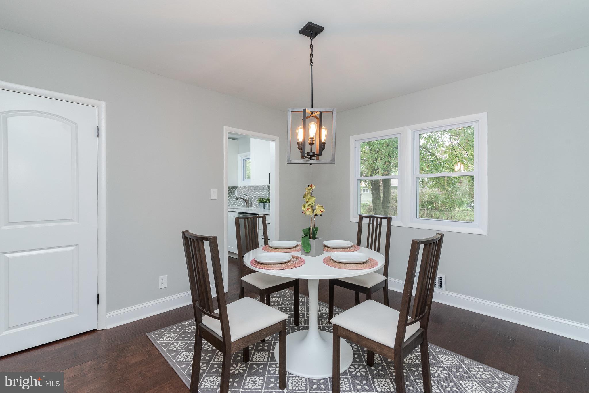 6306 Tramore Road Baltimore, MD 21214 - Photo 14 of 43 a view of a dining room with furniture window and outside view