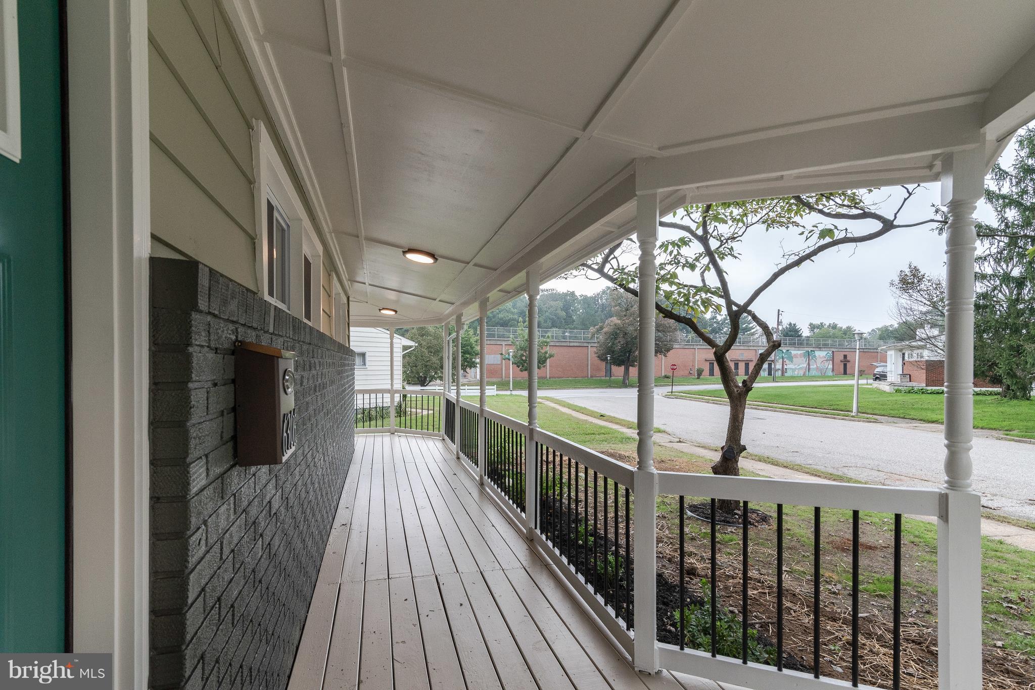 6306 Tramore Road Baltimore, MD 21214 - Photo 8 of 43 a view of a porch