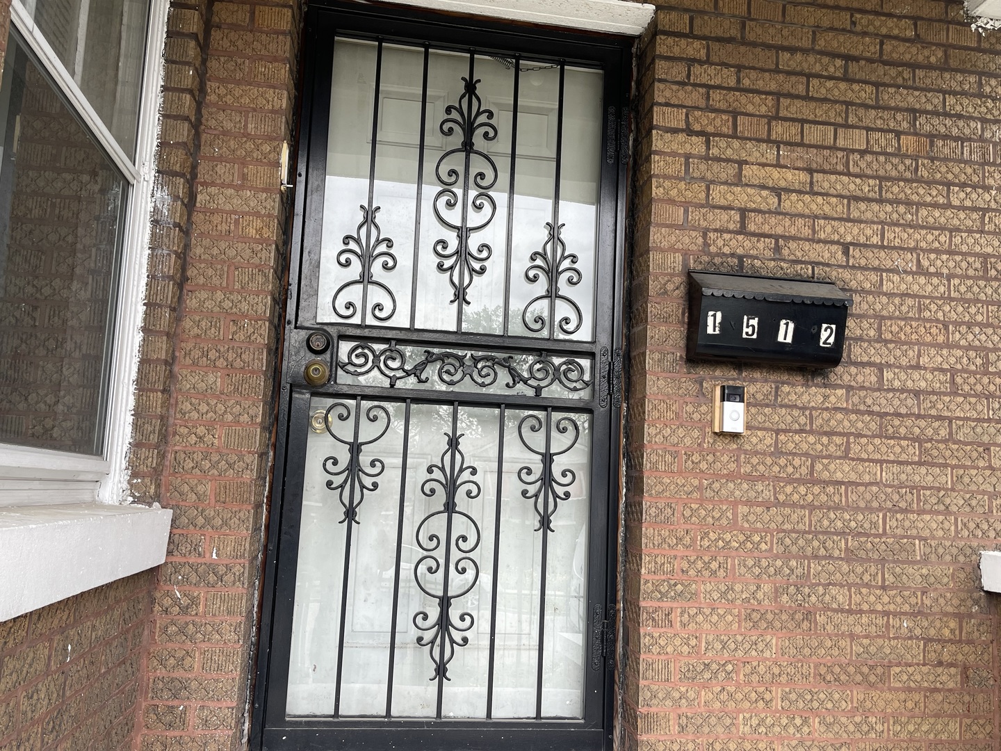 1512 North Linder Avenue Chicago, IL 60651 - Photo 5 of 19 a sign that is on the side of a building