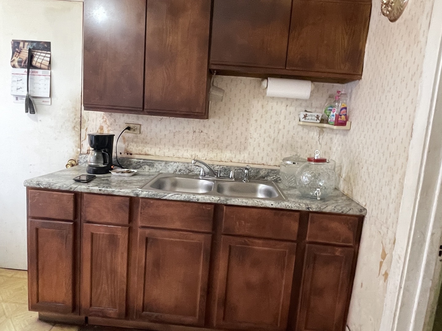 1512 North Linder Avenue Chicago, IL 60651 - Photo 10 of 19 a kitchen with a sink and cabinets