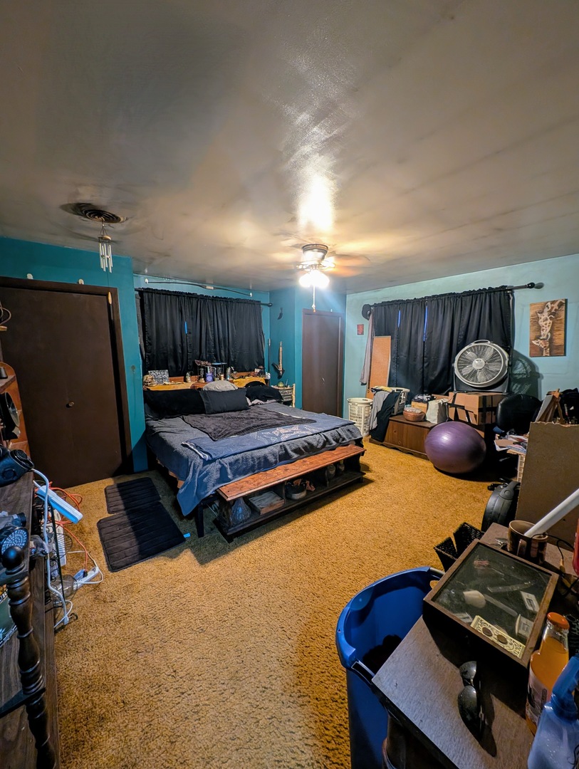 1824 Cobb Boulevard Kankakee, IL 60901 - Photo 14 of 30 a bedroom with furniture and a desk