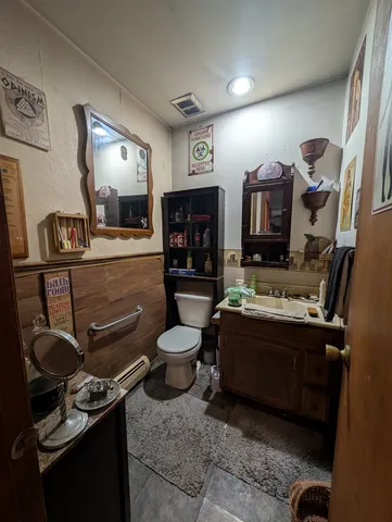 a utility room with sink dryer and washer