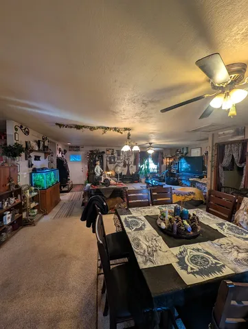 a view of a chairs and table in a terrace
