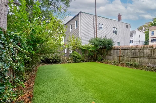 a house view with a garden space