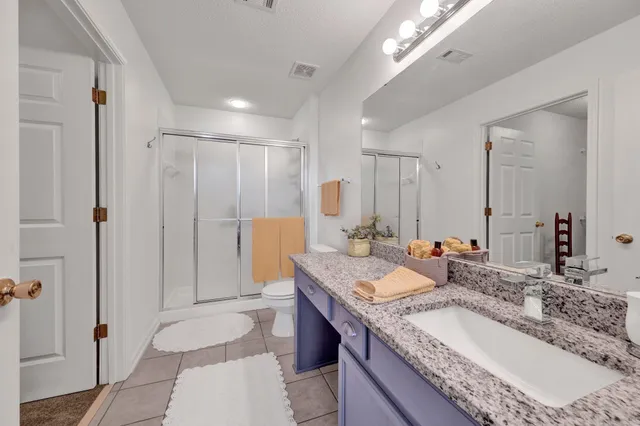 a bed room with a bed and a window