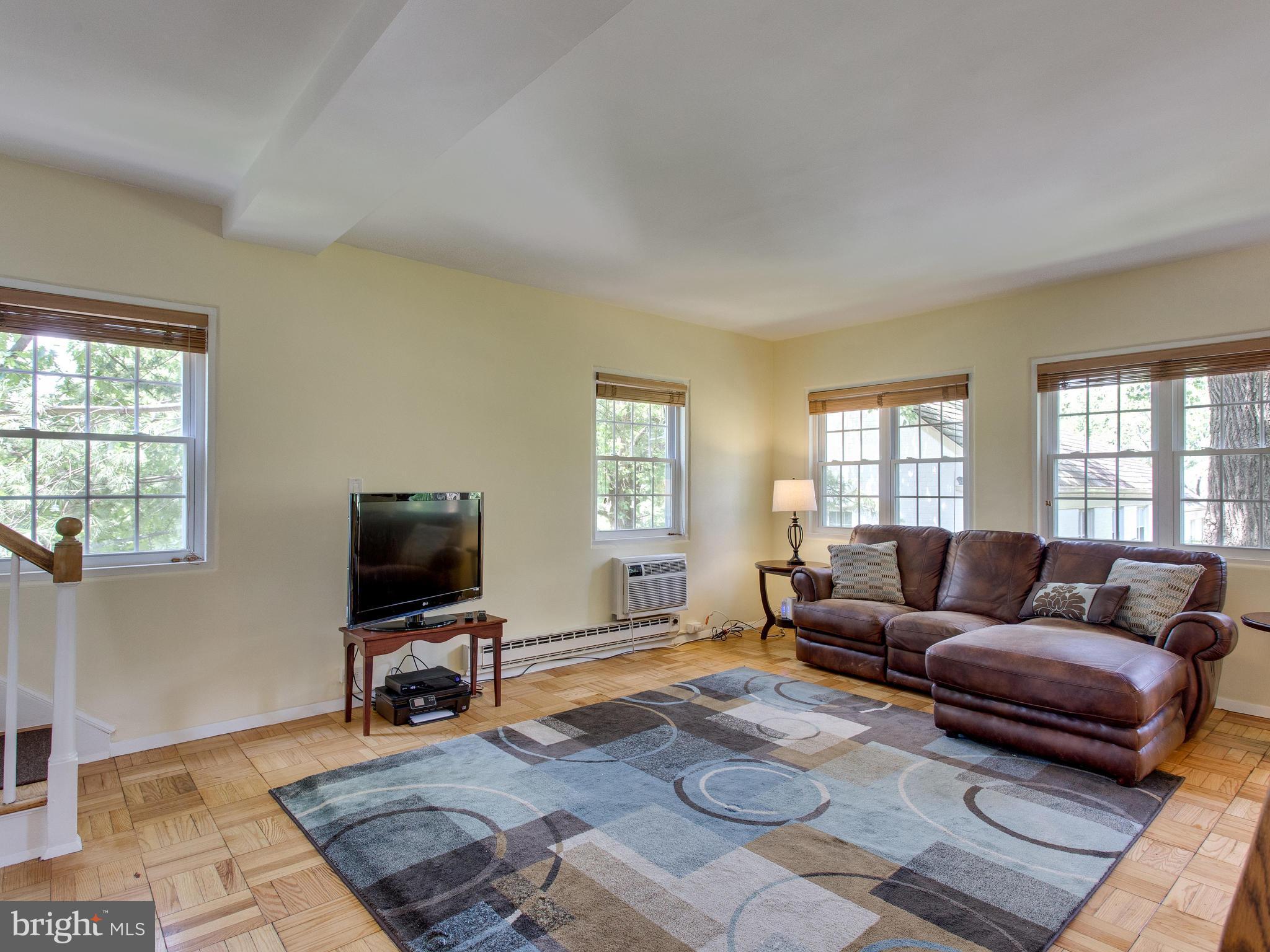 3753 Gunston Road Alexandria, VA 22302 - Photo 7 of 17 Spacious living room with beautiful parquet floors