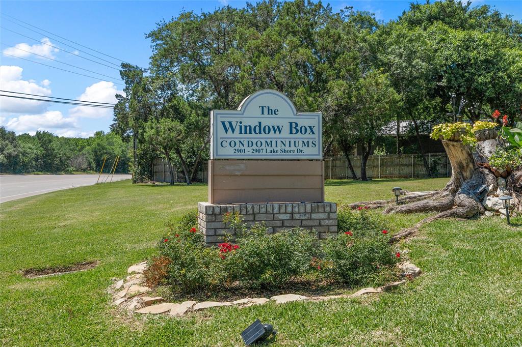 2901 Lake Shore Drive, Unit 405 Waco, TX 76708 - Photo 26 of 31 a sign on the side of the road