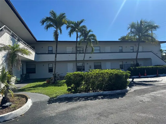 a view of a house with a garden