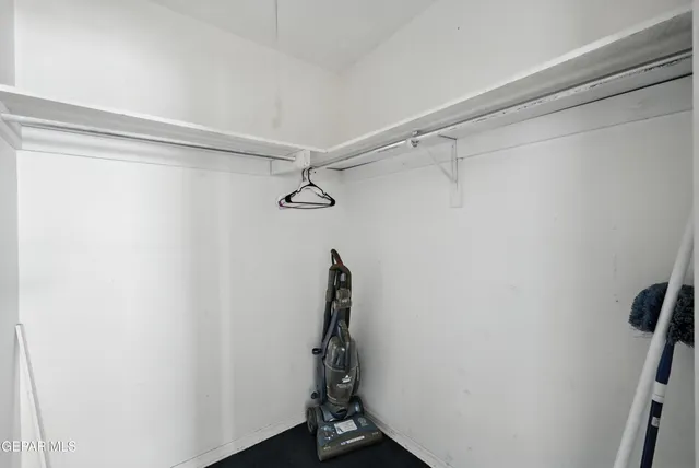 a view of a room with racks on the wall