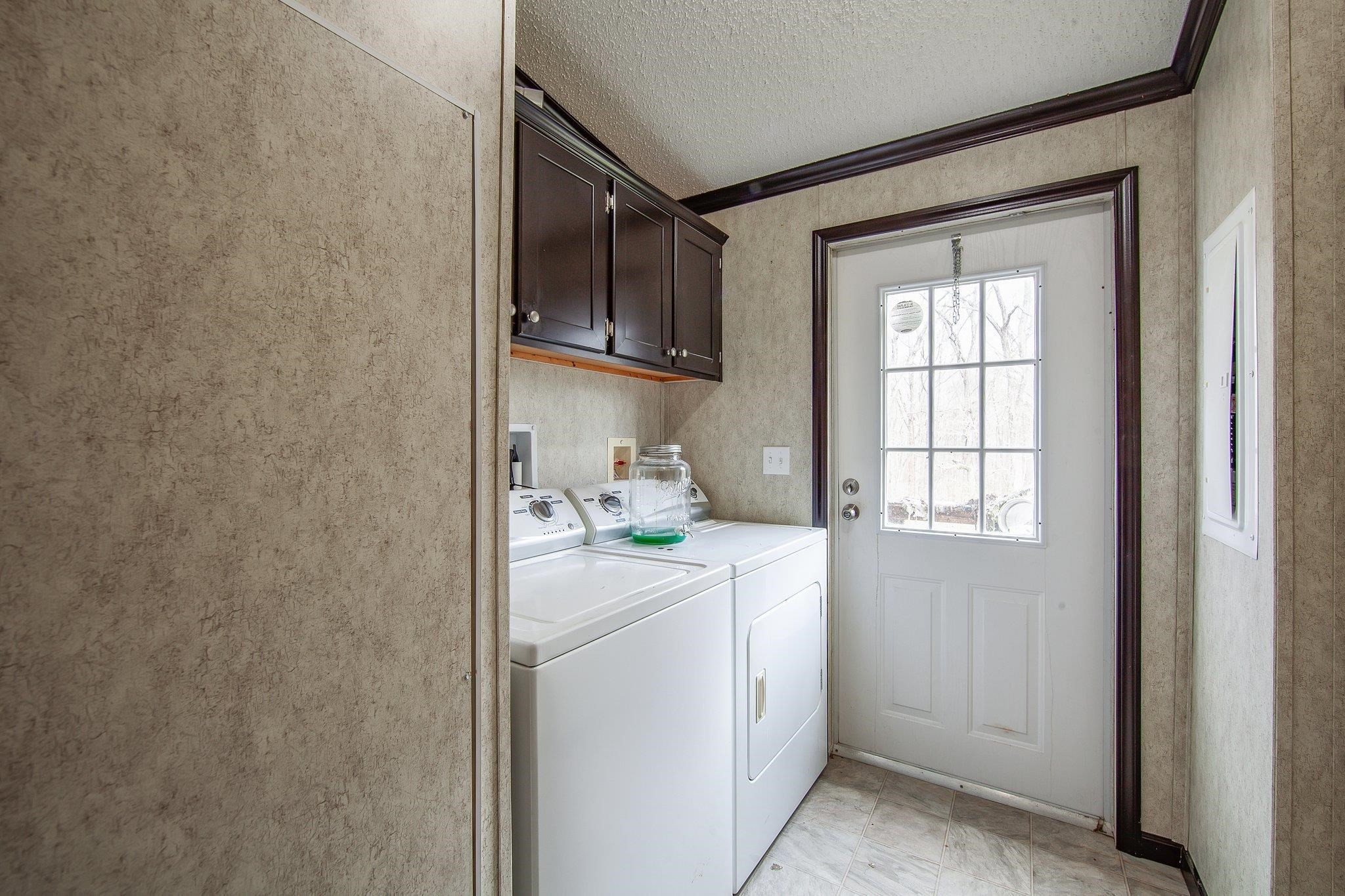 1040 River Road Bolivar, TN 38008 - Photo 5 of 27 a room with storage and utility