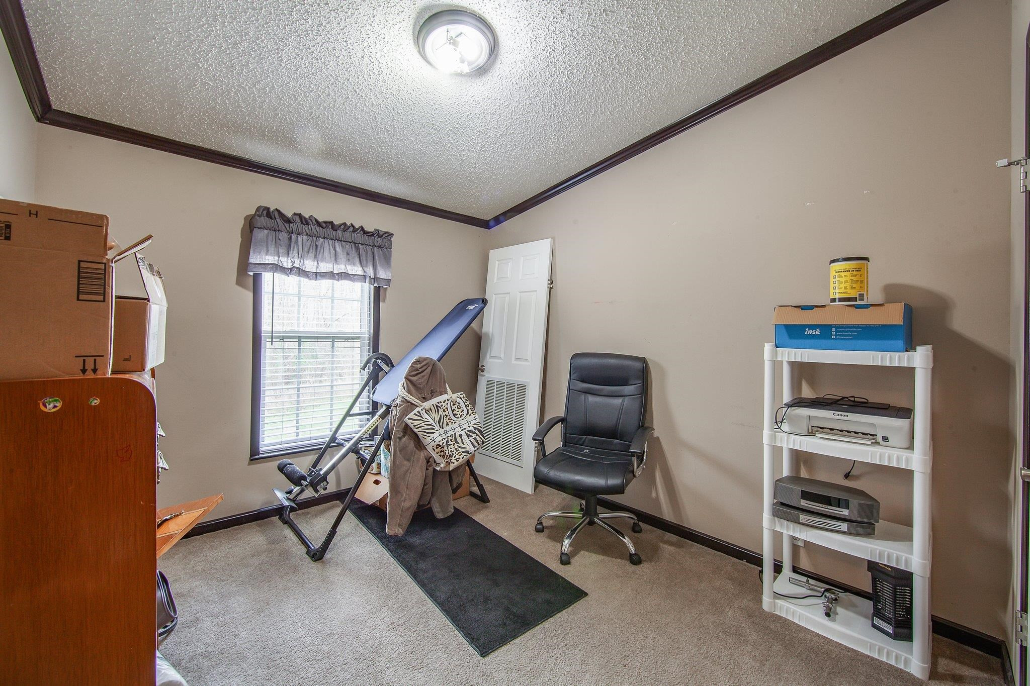 1040 River Road Bolivar, TN 38008 - Photo 7 of 27 a view of a room with gym equipment