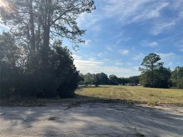 a view of a lake with outdoor space